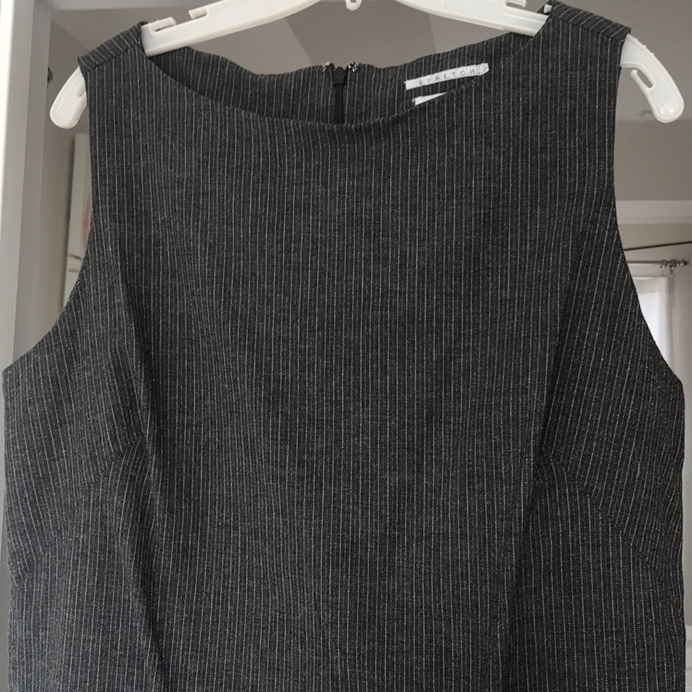 Stretchy pin stripe sleeveless dress with kick pleat